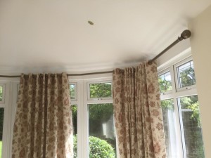 eyelet curtains in sunroom